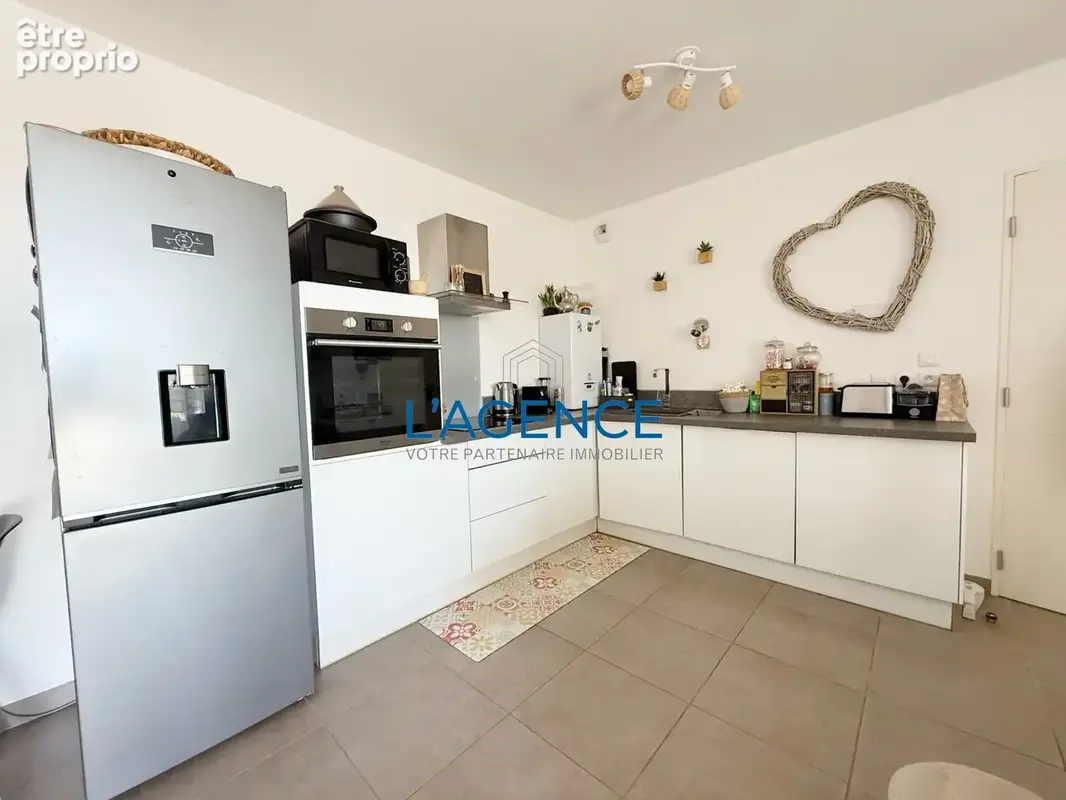 Appartement 3 pièces de 60m2  en étage avec ascenseur, terrasse, stationnement en sous-sol - photo 6