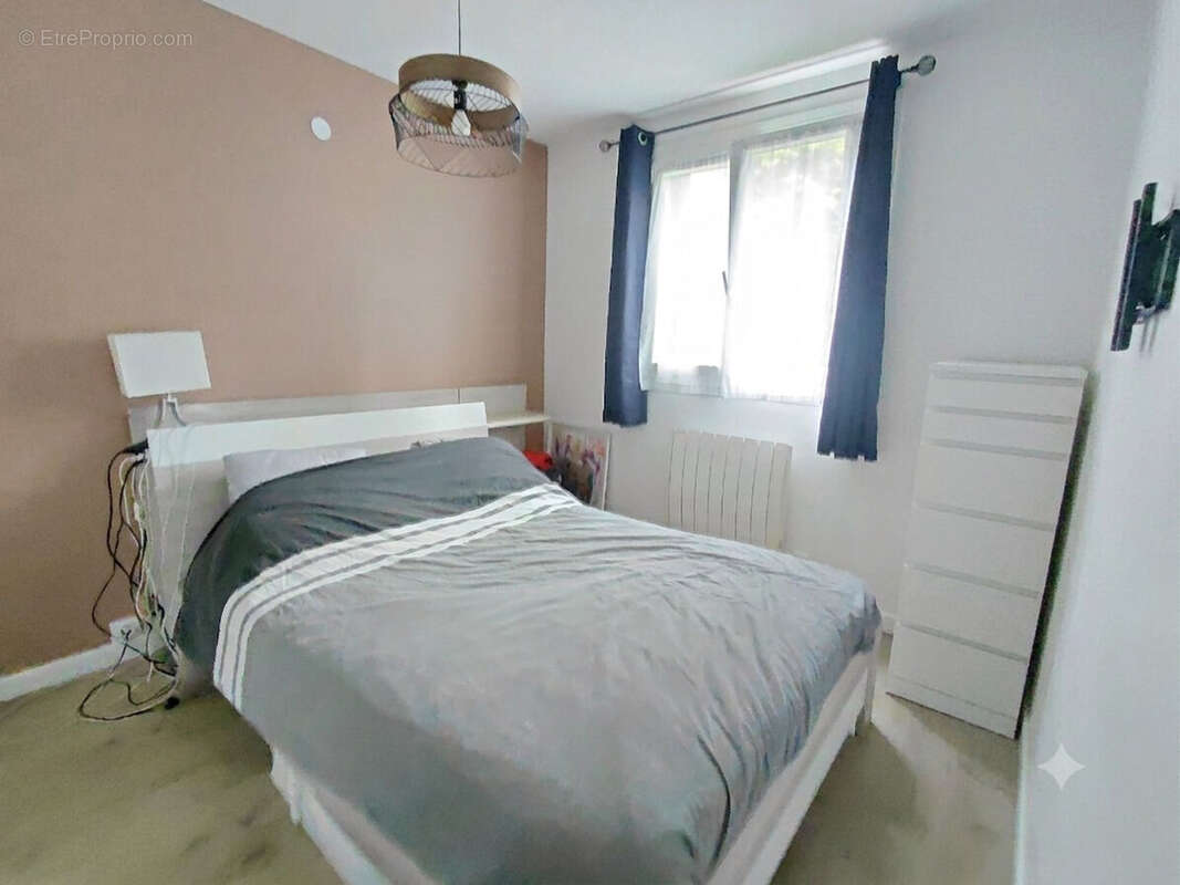 Appartement  76 m² en rez-de-jardin (3 chambres) - photo 6
