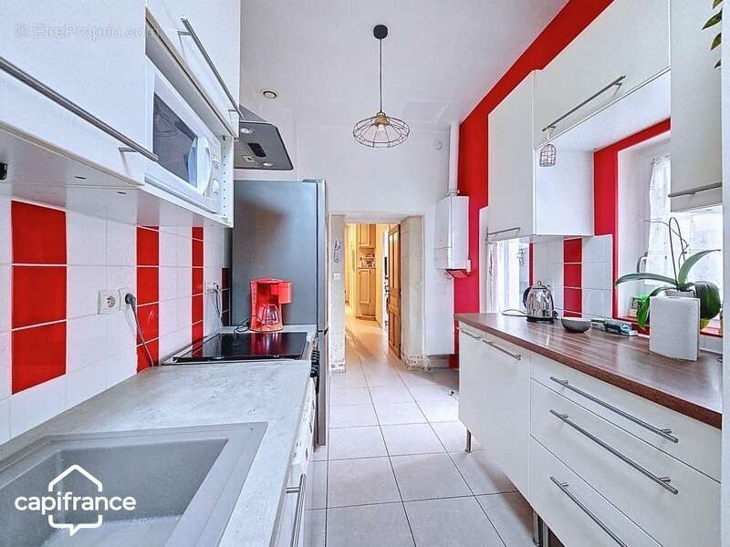 THOUARS  Place Lavault  Maison de 120 m2 4 chambres - photo 3
