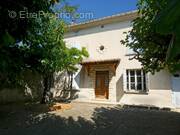 Maison à LAUDUN-L'ARDOISE