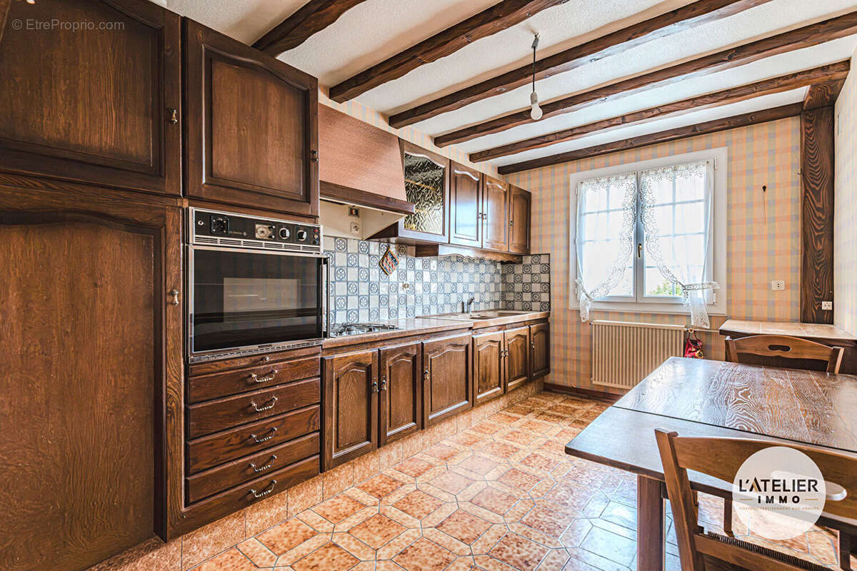 Maison familiale de 101 m² avec jardin et sous-sol complet - photo 6