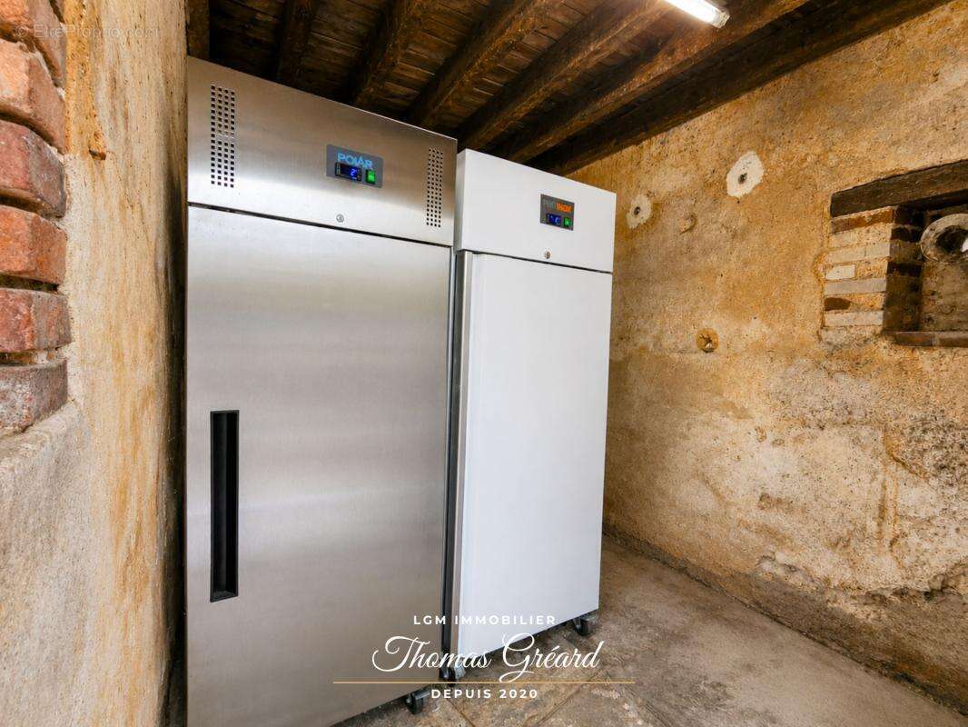  Immeuble mixte avec murs commerciaux, appartement, annexe et grange – Rentabilité nette de 8,2 % - photo 11