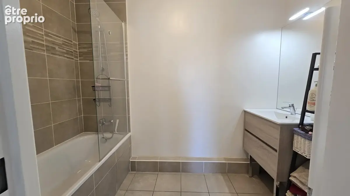 3 pieces au pied des commerces - neuf - 2 chambres - 2 parking - photo 8