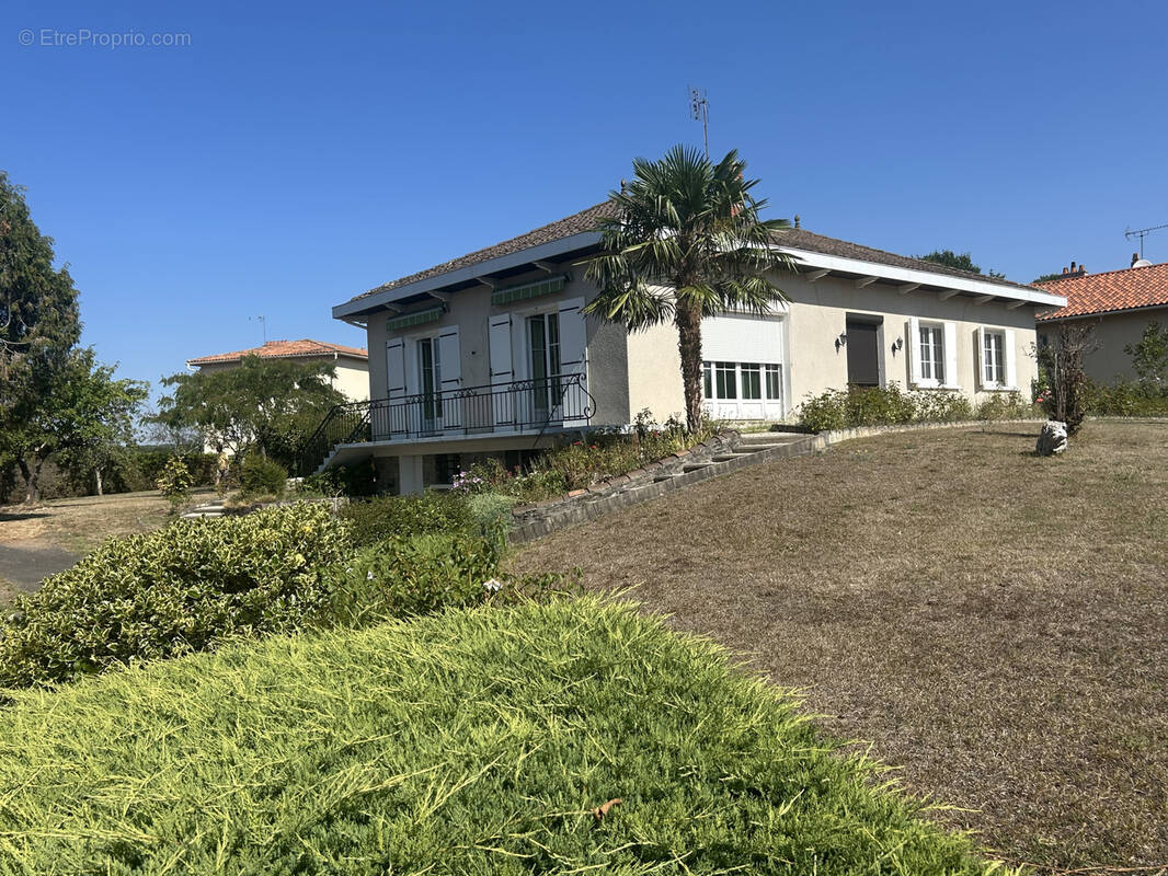 Maison familiale - sous-sol semi eneterre - 3 chambres - photo 1