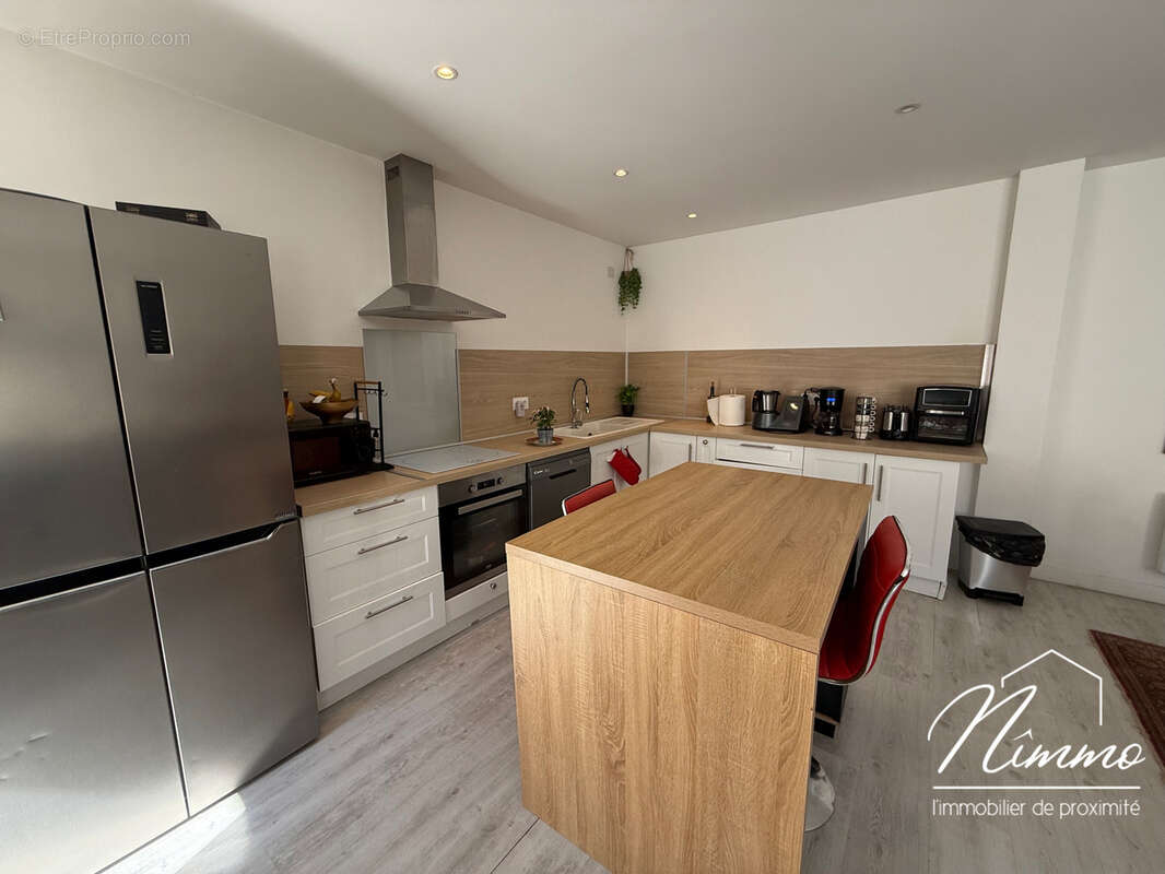 Appartement p4 refait a neuf proche centre ville avec stationnement et cave - photo 2