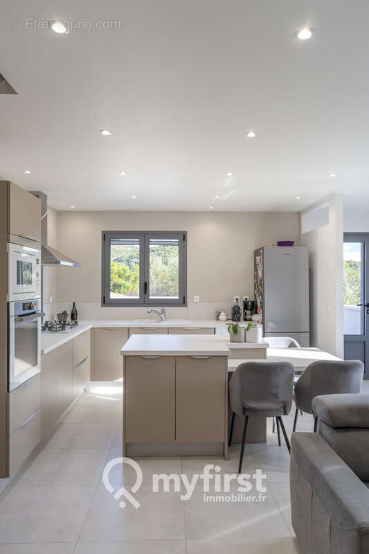 Un appartement entre jardin secret et rooftop suspendu - photo 8