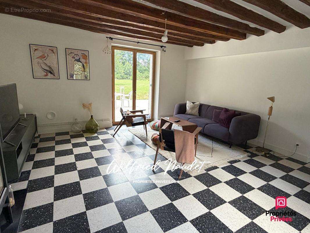 Maison à PARIGNE-L'EVEQUE