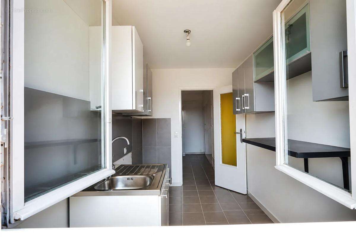 Grand T3 traversant, lumineux, avec balcon filant - 58,29 m2 - photo 4