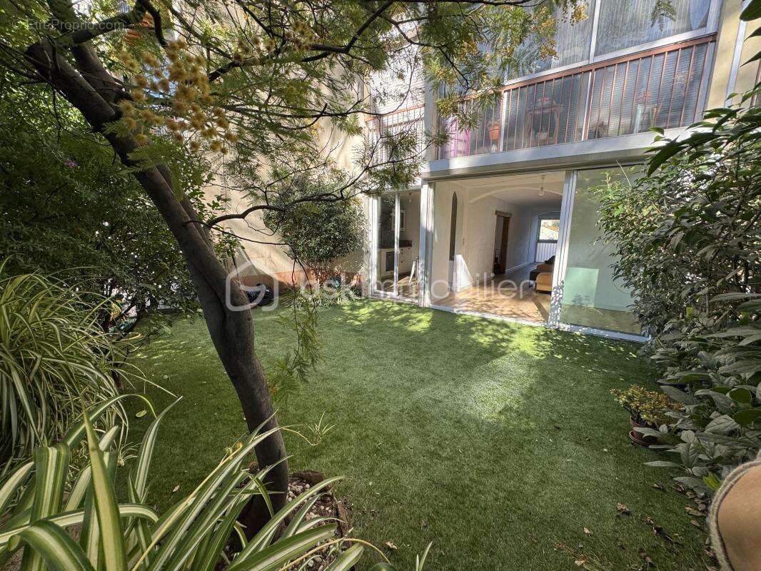 appartement rez de jardin de 105 M2 - photo 9