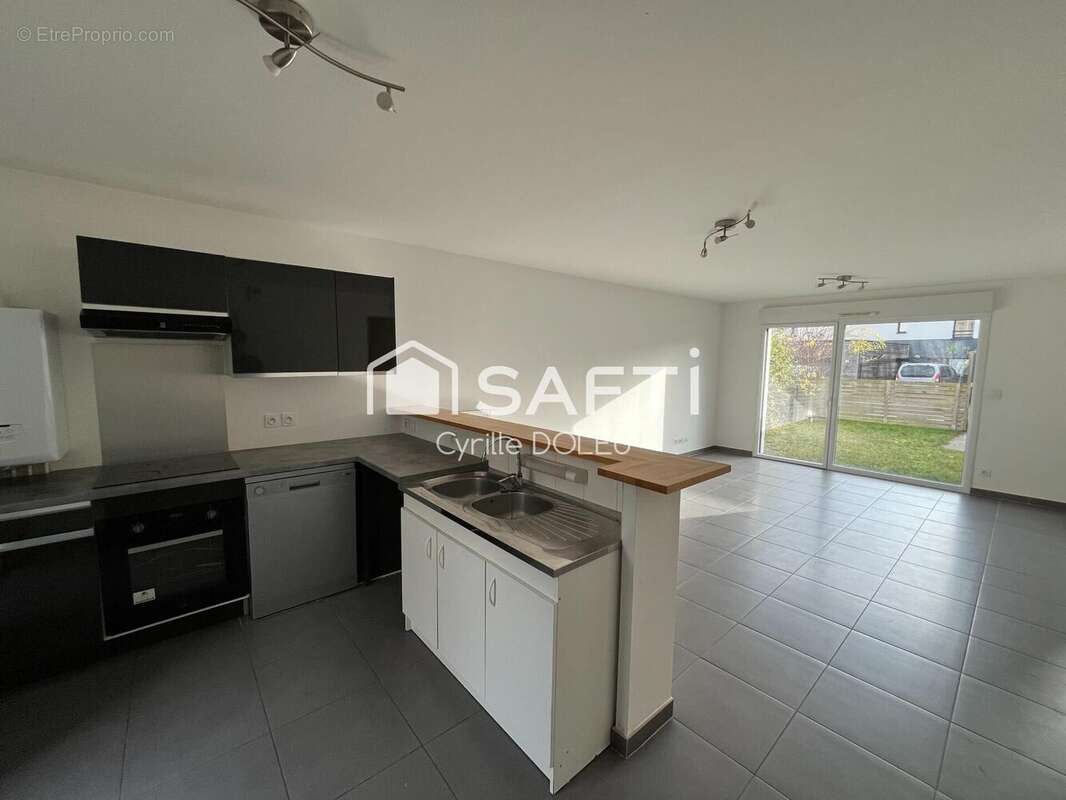 Photo 3 - Maison à THORIGNE-FOUILLARD