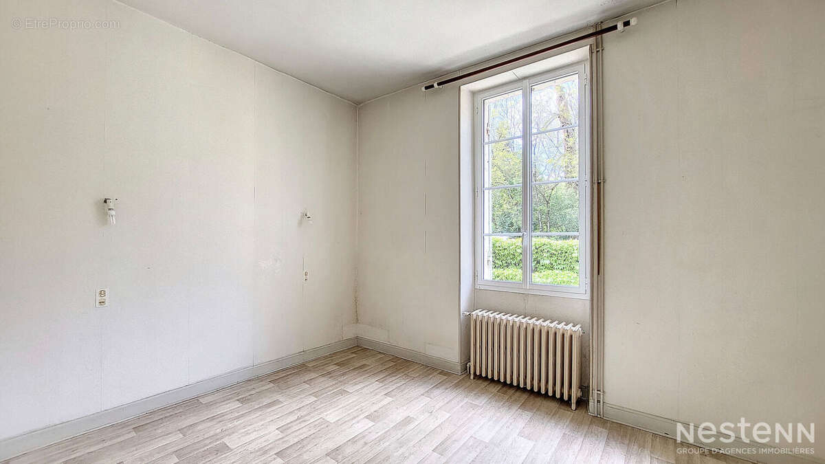 A Vendre Maison de 103 m² avec garages en sous-sol et jardin proche du chemin de Compostelle - photo 6