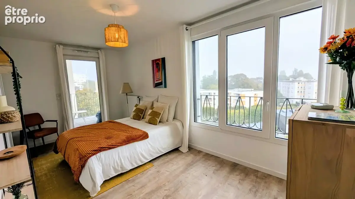 Appartement 113m2 - Terrasse exceptionnelle de 103m2 dominant Rennes Saint-Hélier - photo 12