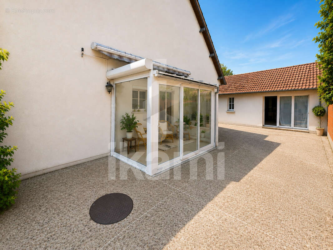 Une maison aux multiples possibilités - photo 2