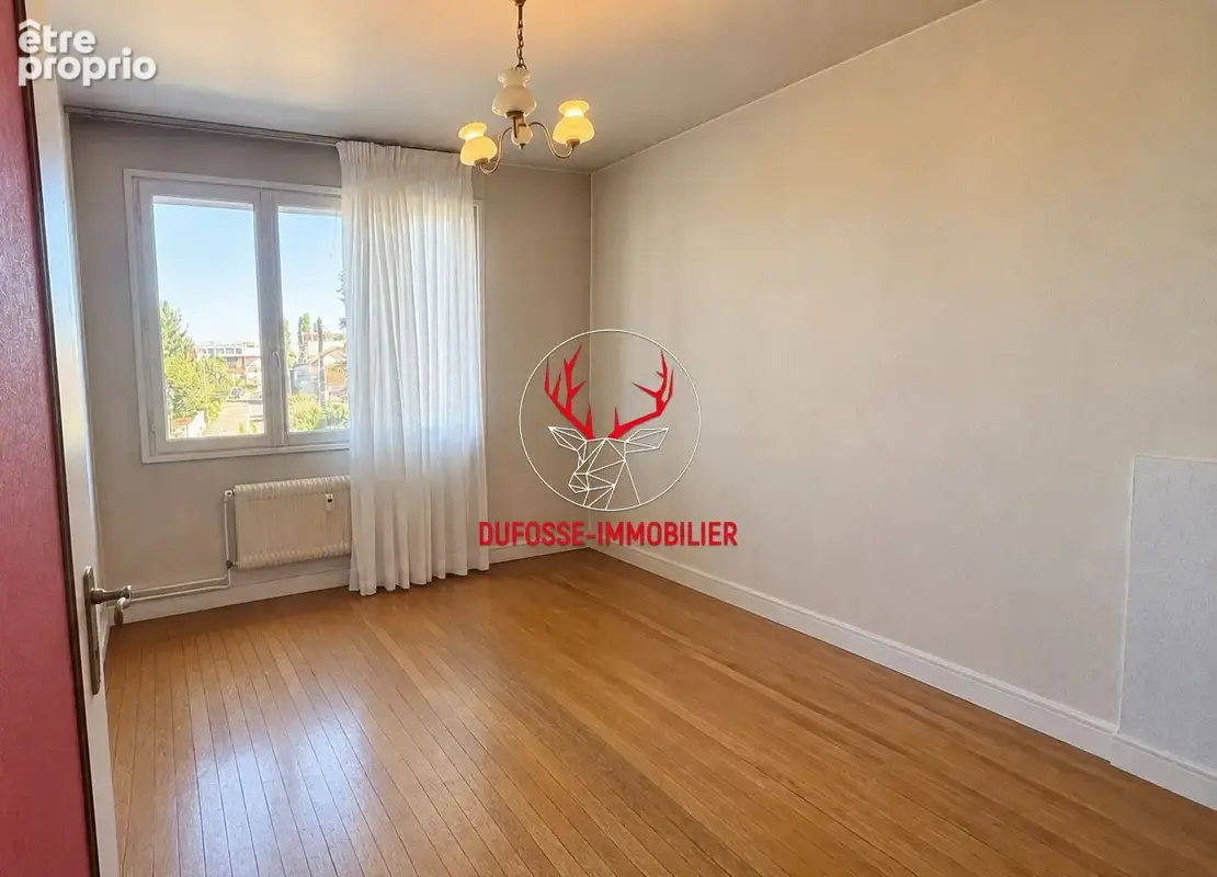 Appartement traversant 78m² avec balcon, cave et garage - Bron centre (69500) - photo 10
