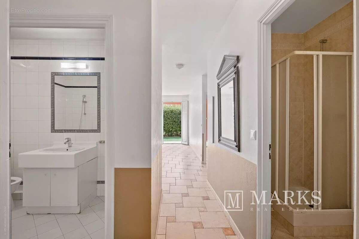 Appartement de 2 chambres avec terrasse, jardin et garage - photo 10