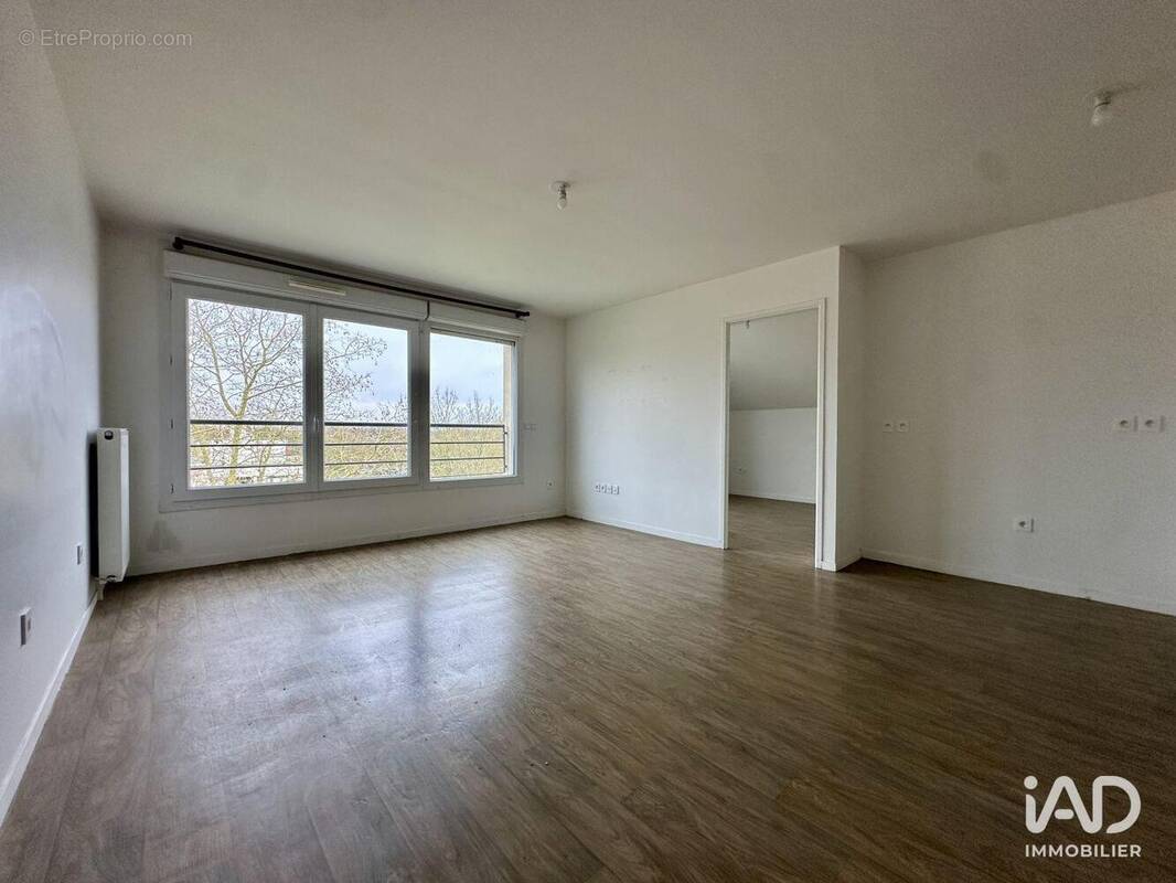 Photo 1 - Appartement à SAVIGNY-LE-TEMPLE