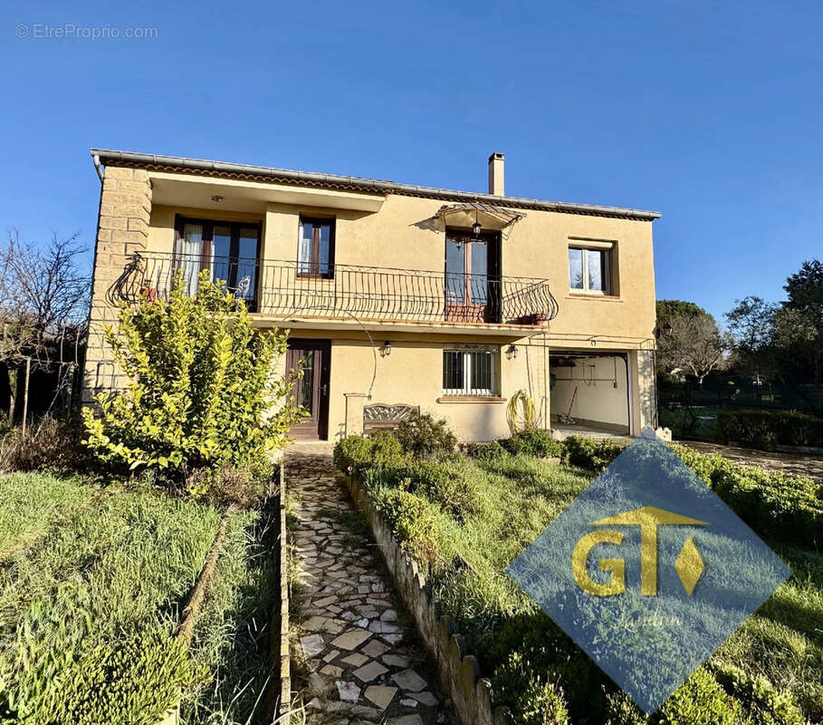 Maison à LAUDUN-L'ARDOISE