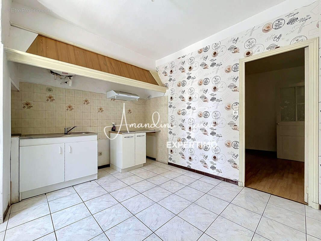 Appartement rez-de-chaussée - photo 2