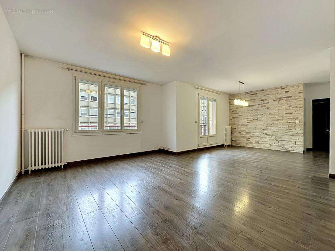 Clemenceau- apt de type 5, 3 chambres avec balcon et garage - photo 2