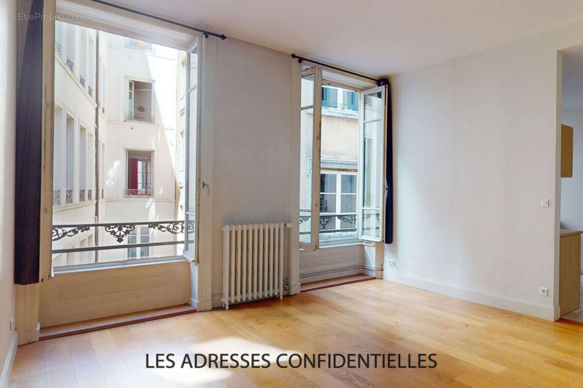 LYON 2 - Cœur  presqu'île dans superbe copropriété - Bel appartement  3 pièces - photo 4