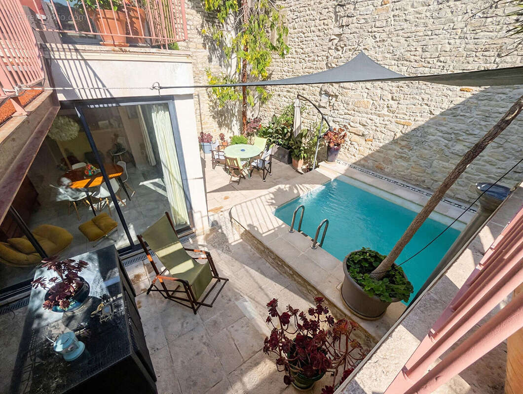 Calvisson ? Maison de caractère avec bassin romain au coeur du village - photo 2