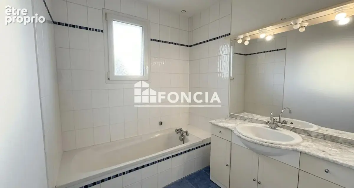 Maison de plain-pied de 100 m² - 3 chambres - photo 5