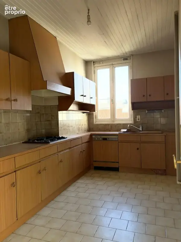 Appartement 6 pièces 98 m² à vendre à Vichy (03200) - photo 5