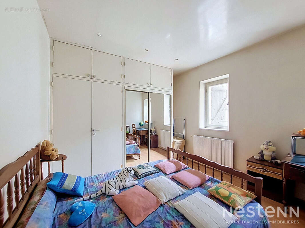 À Vendre Immeuble de rapport avec local commercial de 70 m² et appartement de 84 m² loués au coeur historique de Condom - photo 10