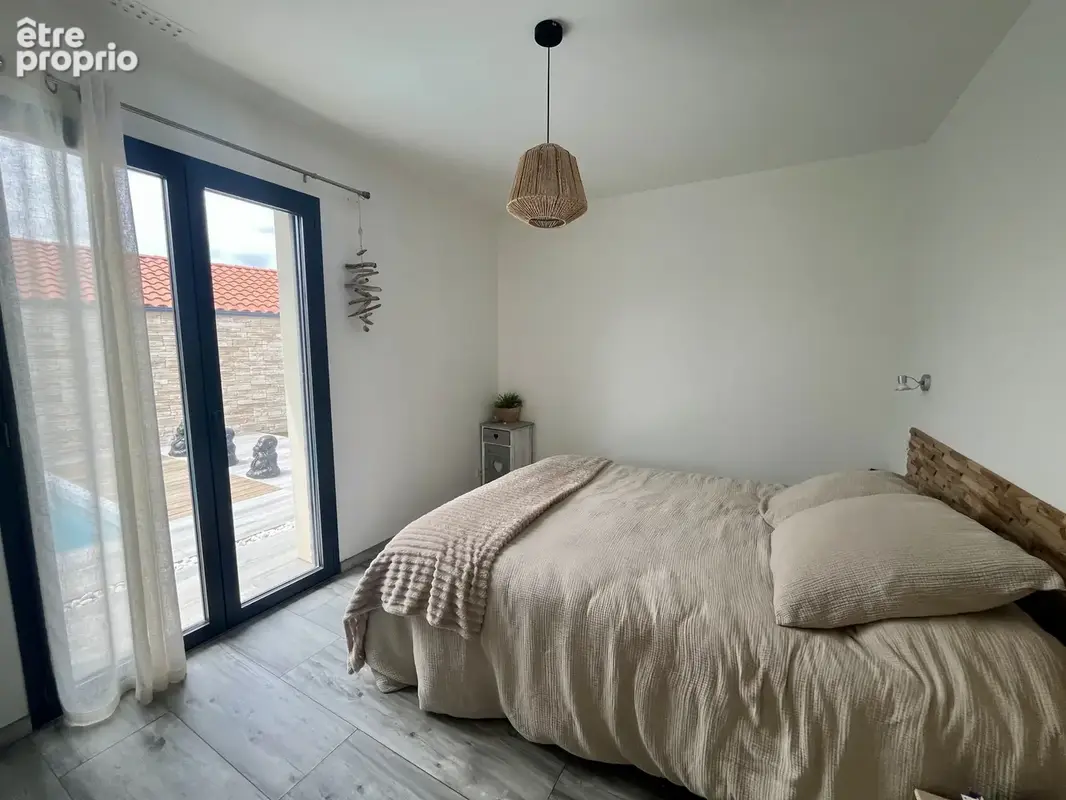 Coup de cœur   Élégante contemporaine de plain-pied avec piscine chauffée - photo 10