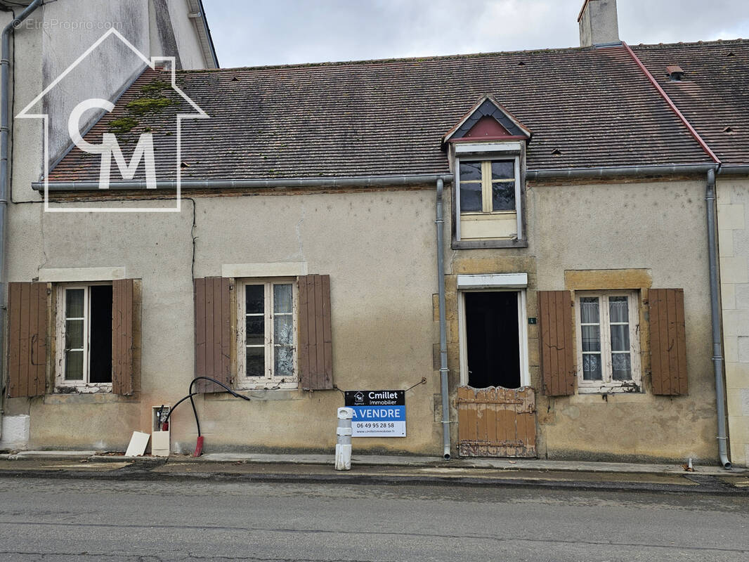 Maison à GARIGNY
