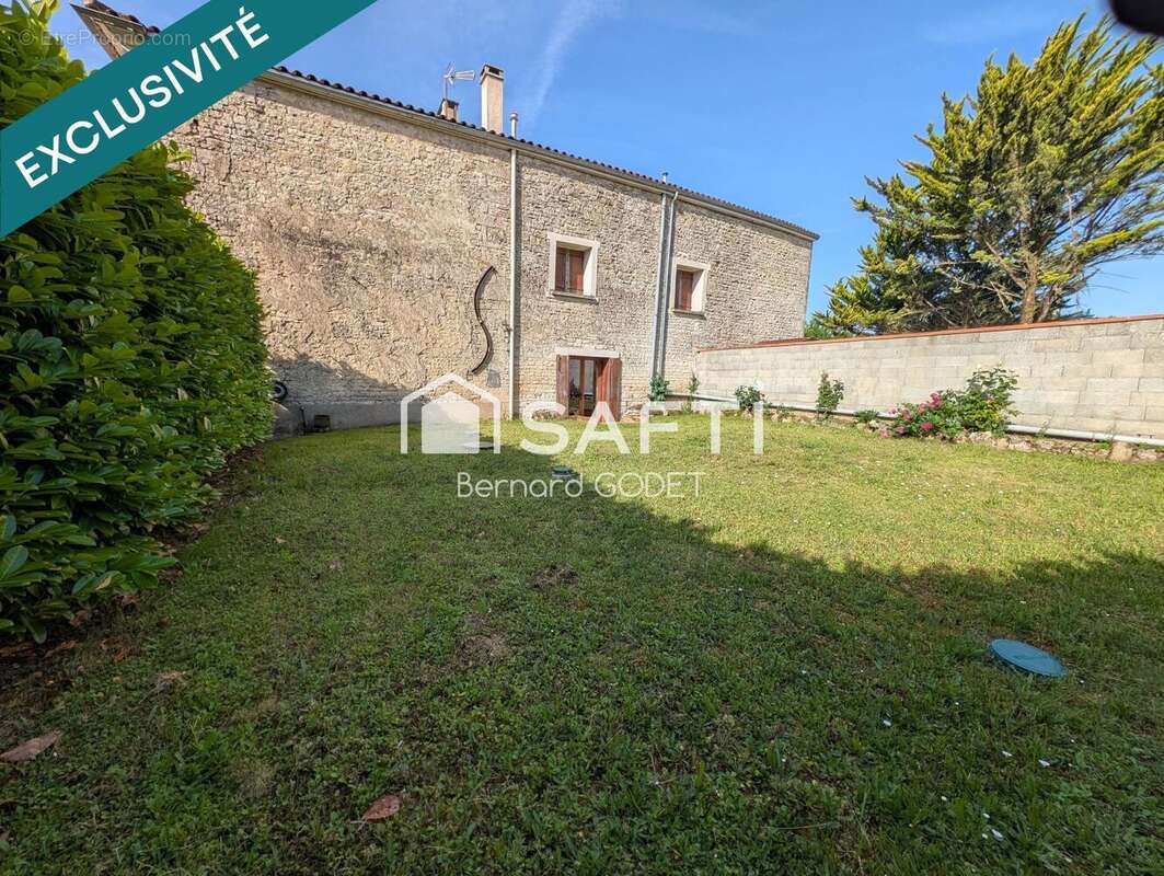 Photo 2 - Maison à COURCOME