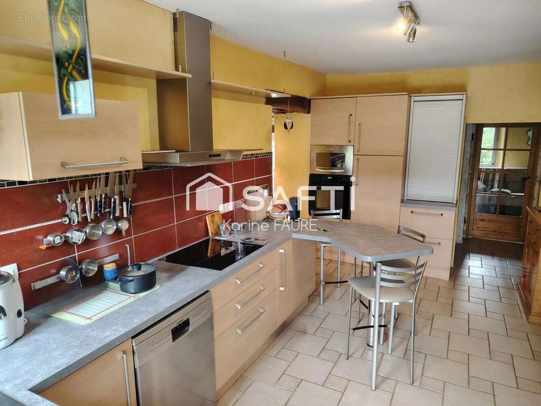 Photo 2 - Maison à LA CHAPELLE-DES-POTS