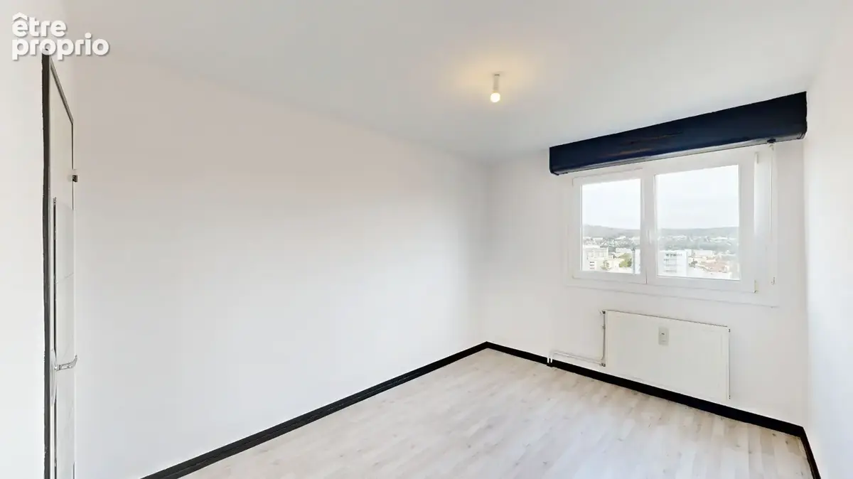 Appartement 4 pièces à vendre à Besançon - 10ème étage avec vue panoramique - photo 7
