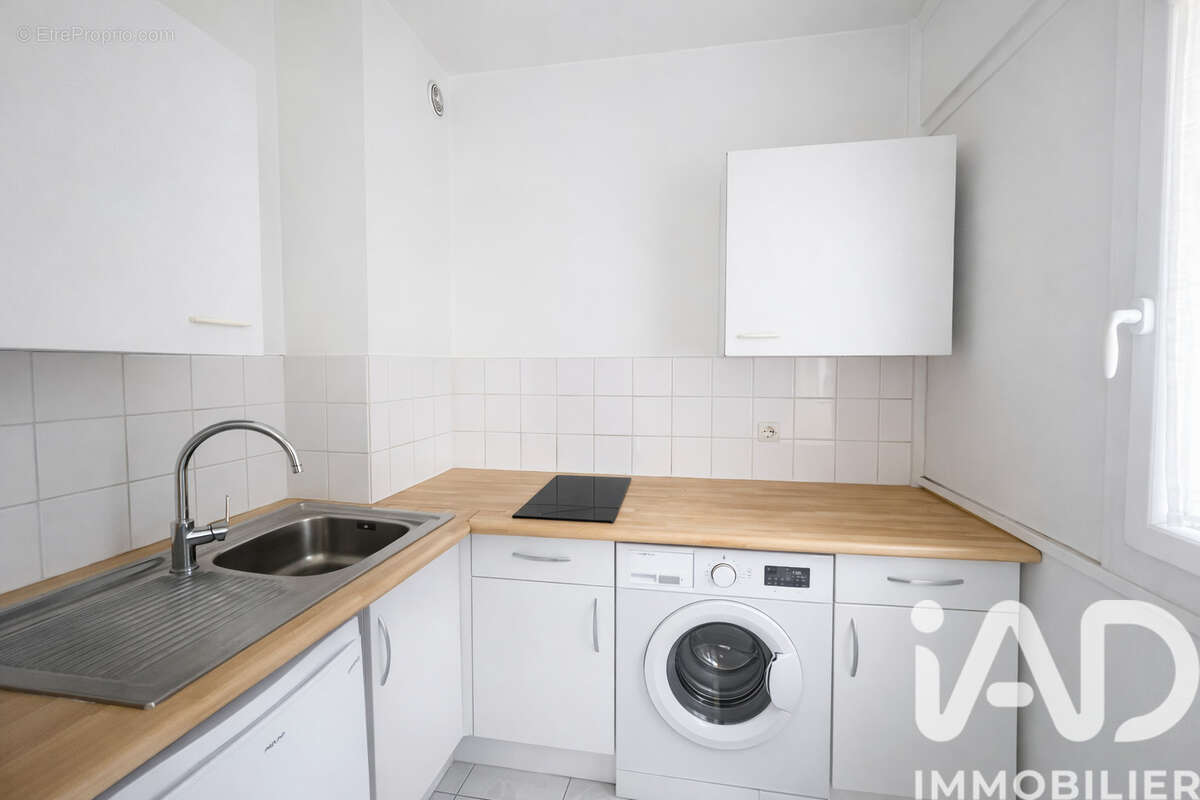 Photo 9 - Appartement à COURBEVOIE