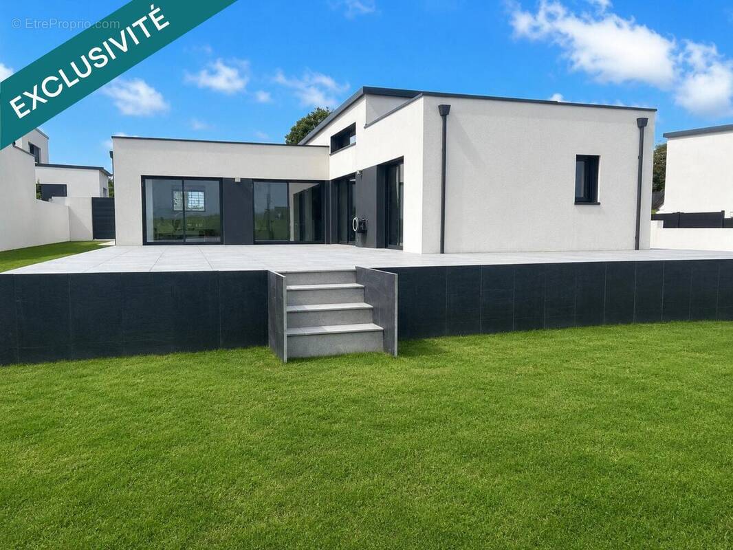 Photo 1 - Maison à LANDIVISIAU