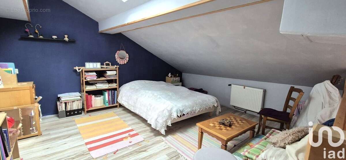 Maison 115 m² à Etival  - photo 8