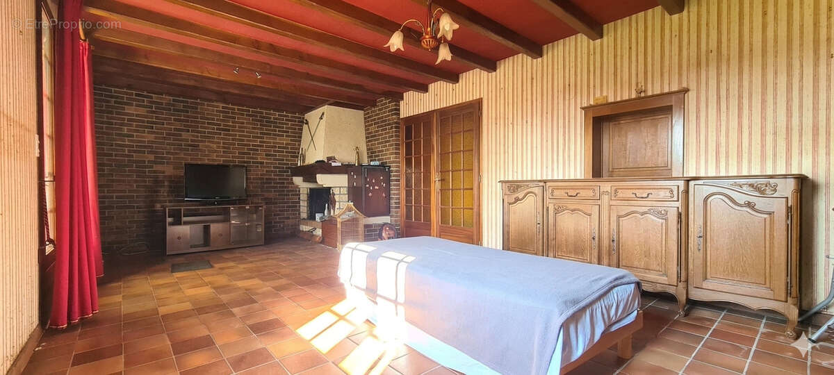 Maison à MOGNEVILLE