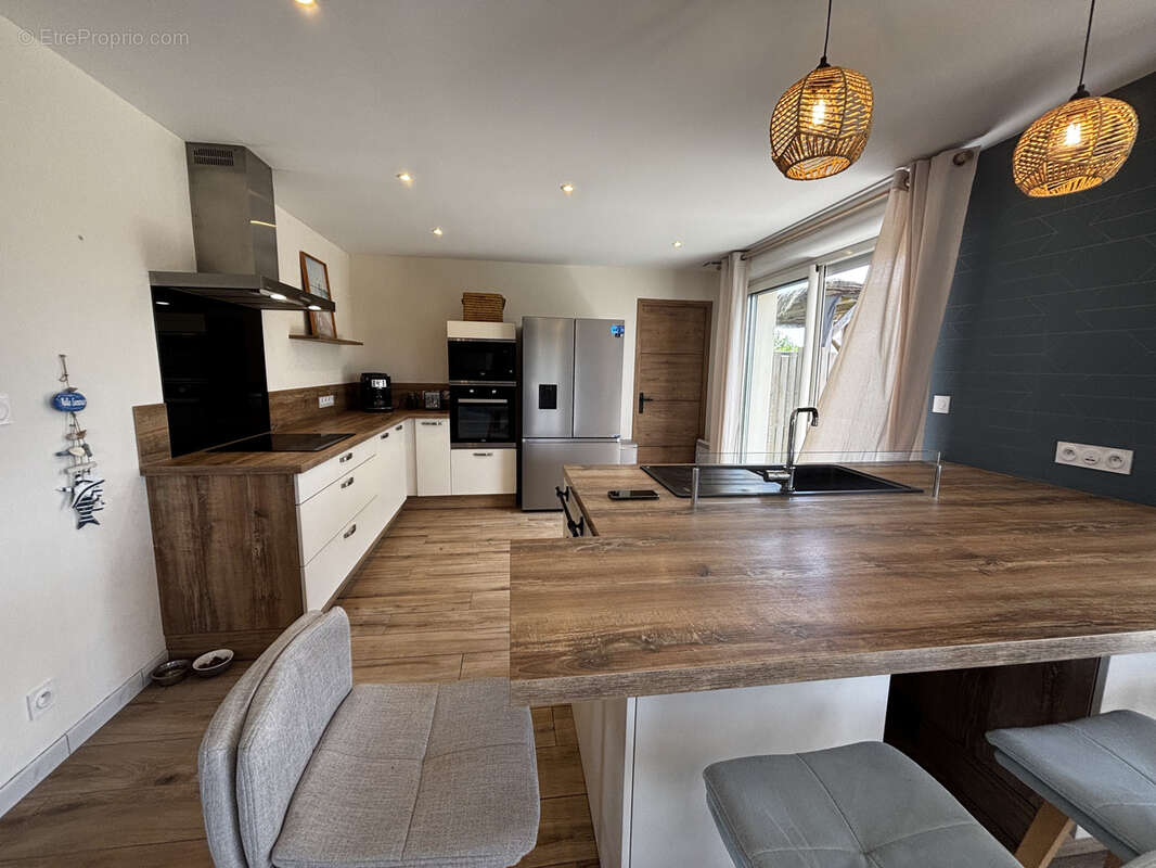 Maison 150 m² à Beaumont-En-Veron  - photo 4