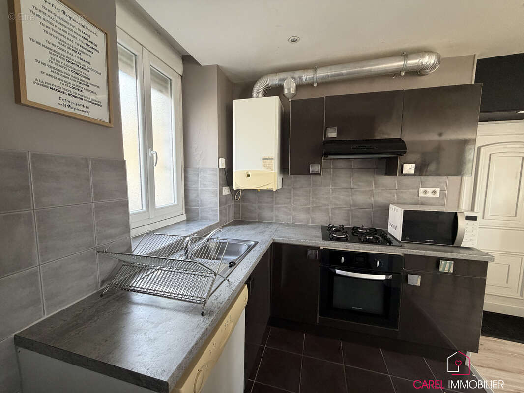 Spacieux T2 de 53m2 avec balcon, garage et possibilité de créer un 2nd appartement - photo 4