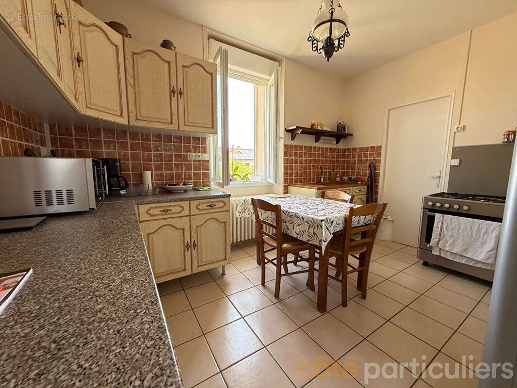 Coup de coeur à Orval : maison rénovée et dépôt d'artisan de 115 m² - photo 4