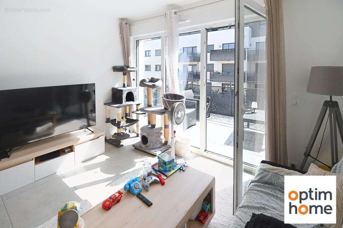 Appartement plain pied 50m2 environ - terrasse - place de parking privative - vendu meuble - photo 3