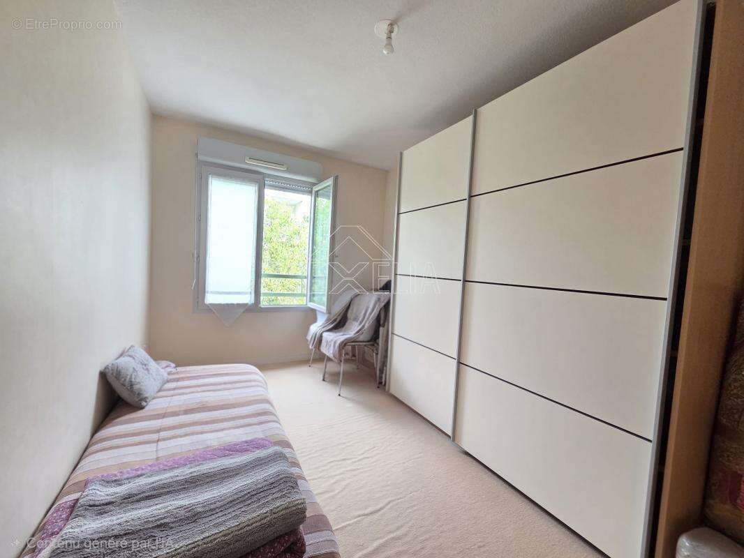 Appartement 3 pièces de 64 m² avec balcon, ascenseur et parking à Mantes-la-Jolie - photo 7