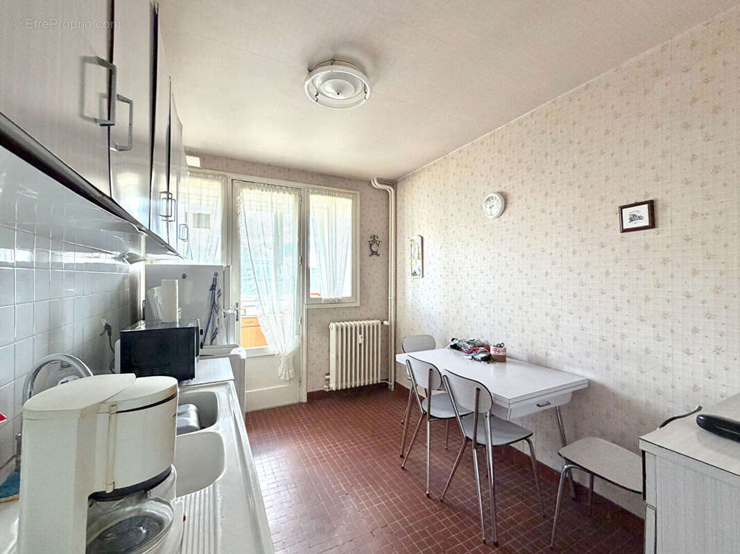 Appartement T3 de 57,24 m² avec balcon et garage - photo 2