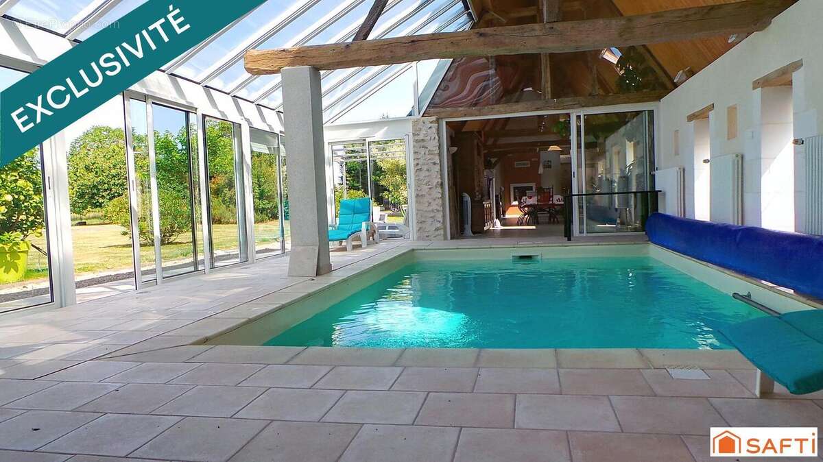 Photo 5 - Maison à NEUILLE-PONT-PIERRE