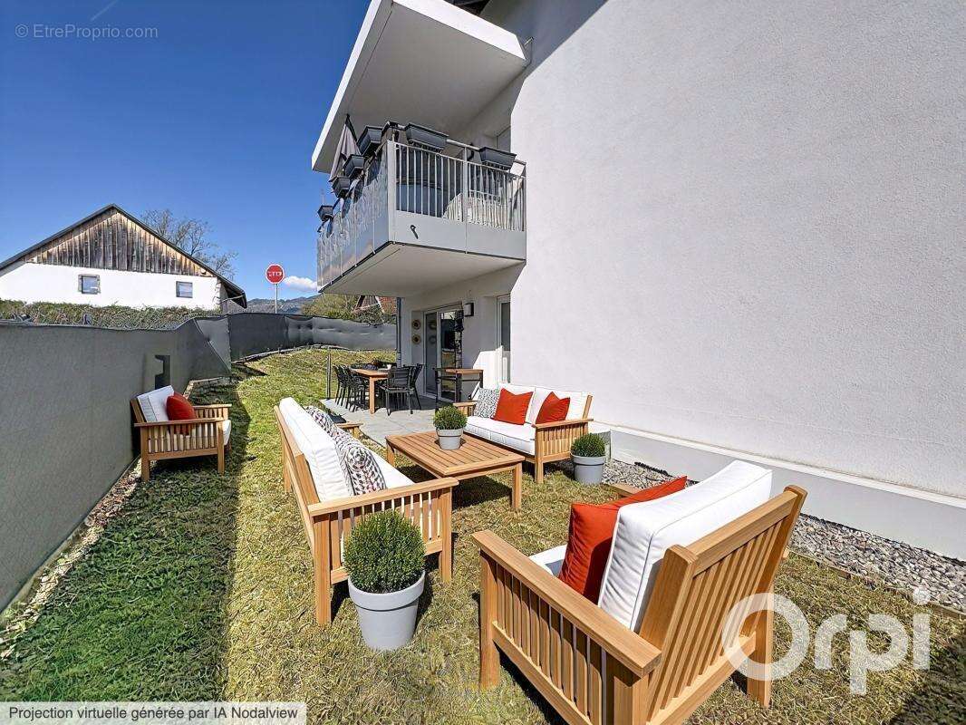 NANGY - Appartement rez-de-jardin - photo 11