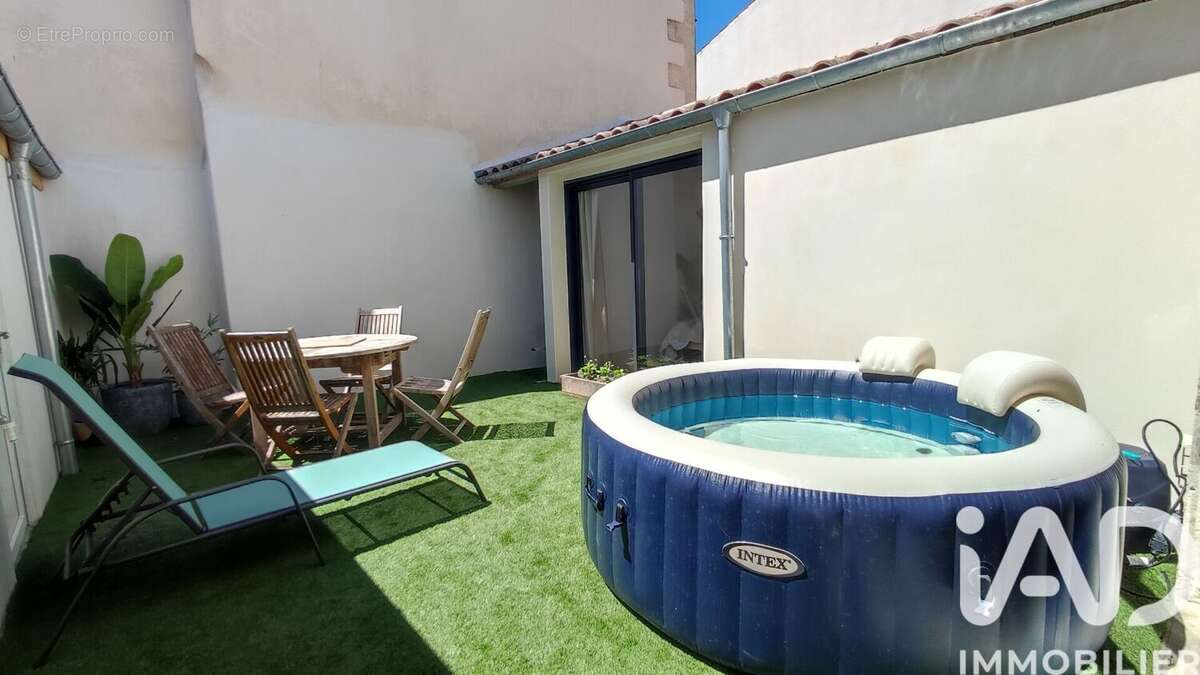 Maison 86 m² à Angoulins  - photo 7