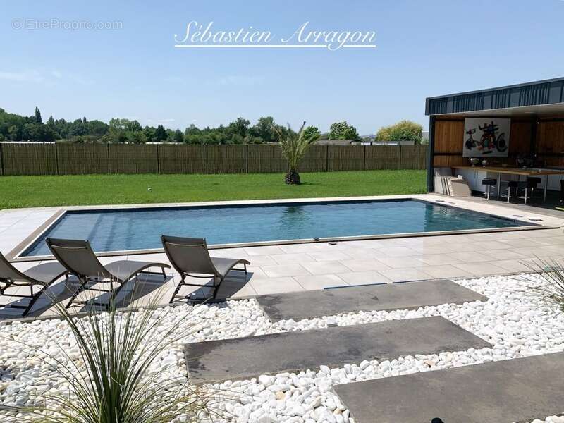 Villa contemporaine d’architecte avec piscine Art de vivre à la campagne, en Lot-et-Garonne- GRANGES SUR LOT (47) - photo 5