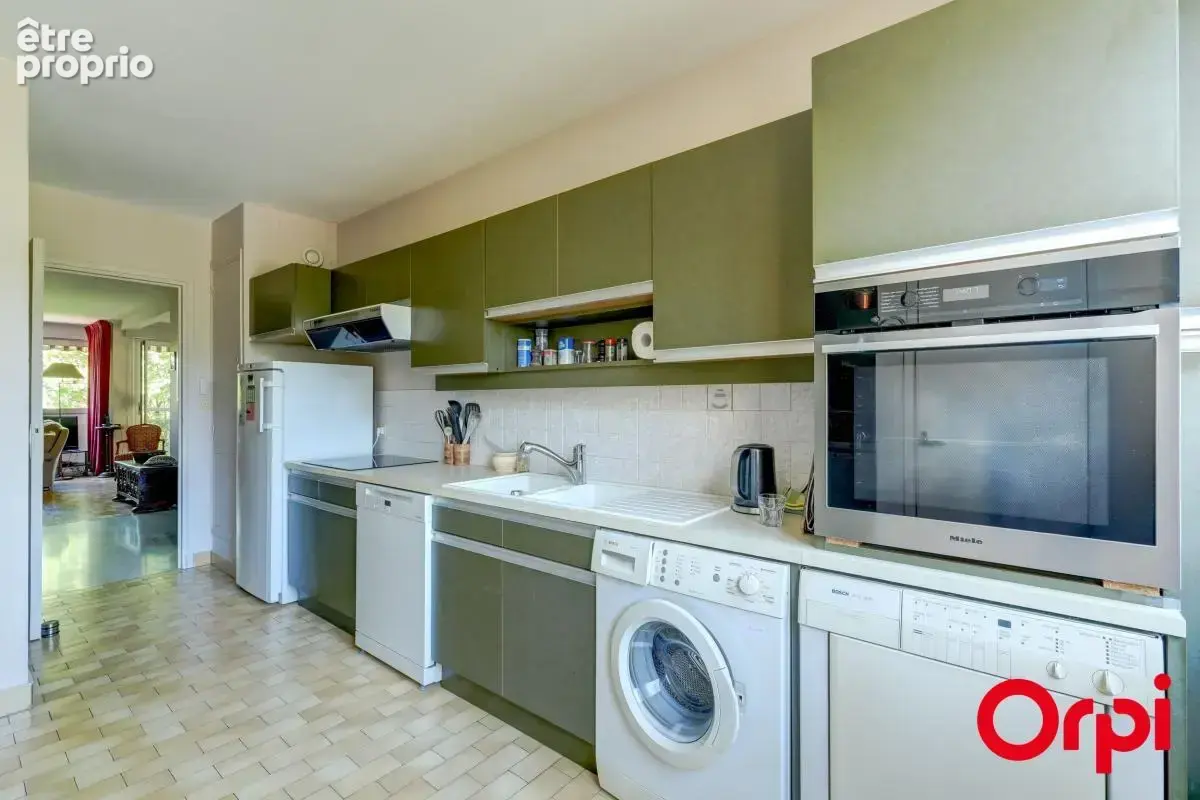 CALUIRE BOURG - T5 de 106,90 m² traversant dans résidence de standing - photo 7