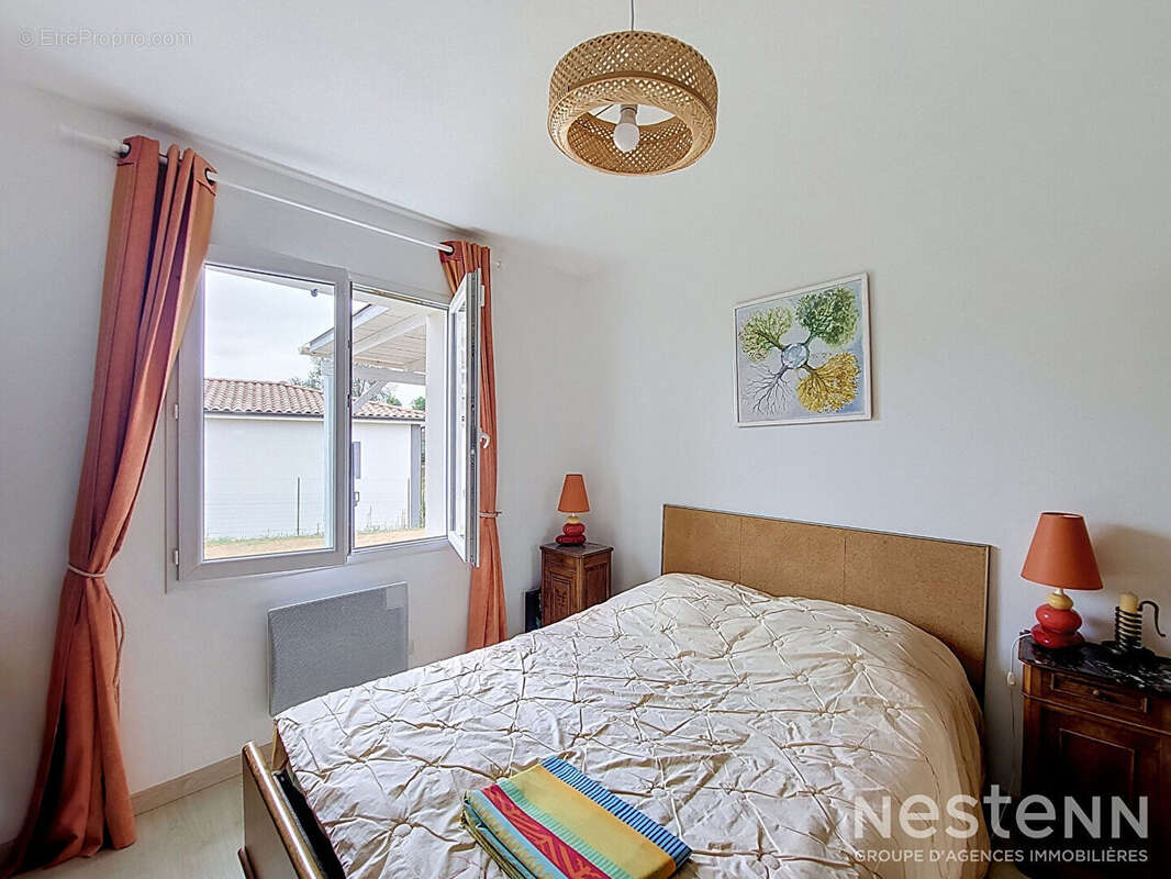 A Vendre Maison contemporaine de plain-pied avec trois chambres, garage et jardin à Condom - photo 4