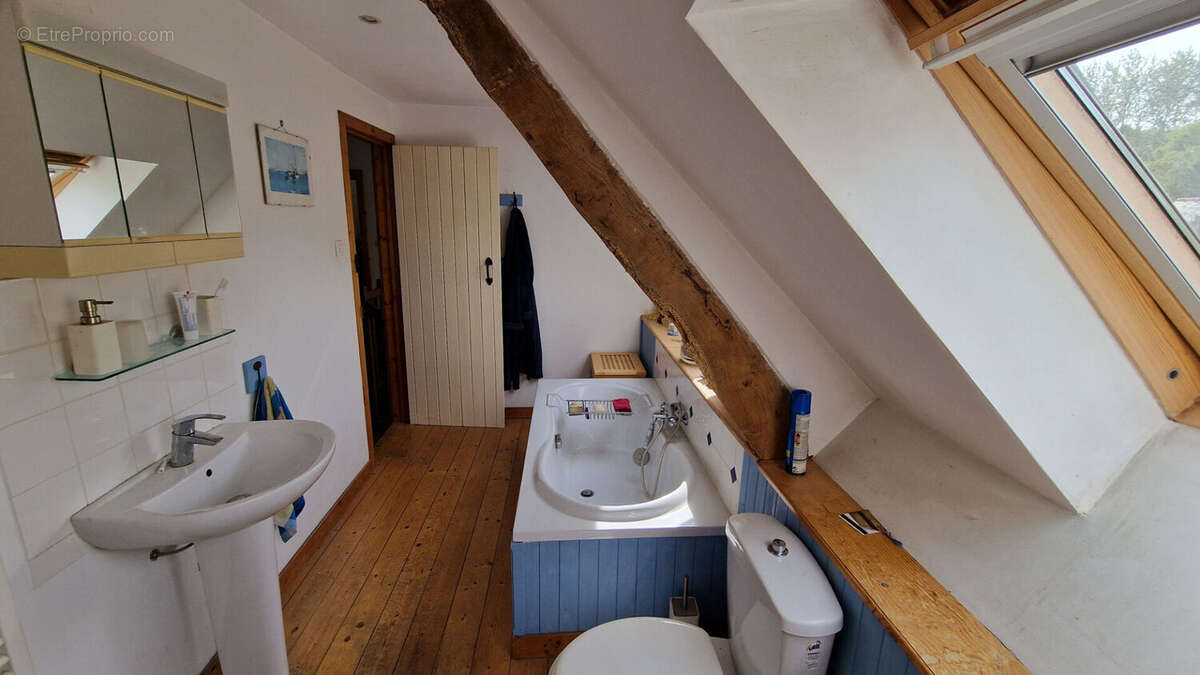 CÔTES D'ARMOR Charmante maison de 2 chambres avec garage et jardin, dans un environnement paisible et proche de la nature. - photo 11